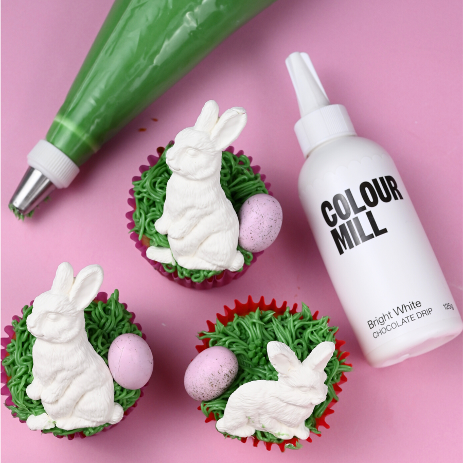 White chocolate bunnies made with Bright White Colour Mill Chocolate Drip.
