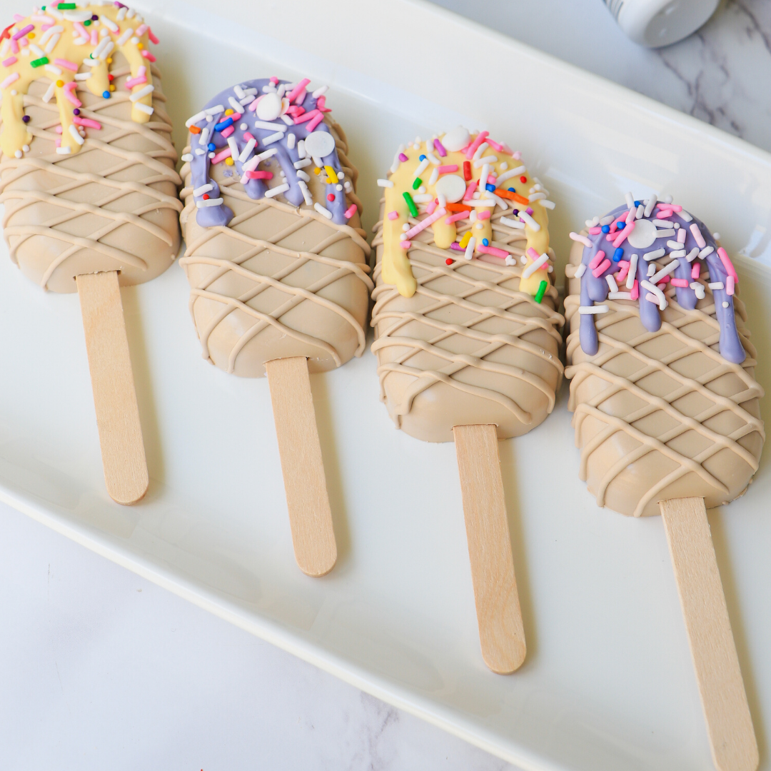 Chocolate covered cake pops coloured with Colour Mill Oil Blend oil-based food colouring in Latte